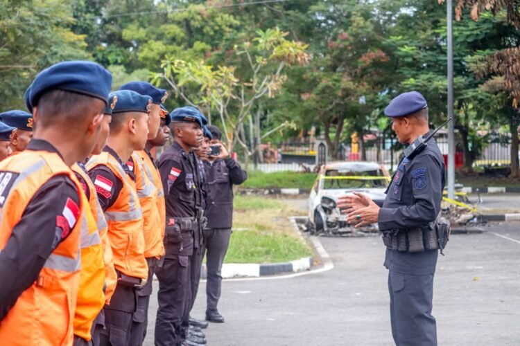 Satbrimob Polda Papua Laksanakan Pembersihan dan Pemulihan Stadion Lukas Enembe 