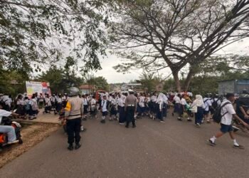 Satlantas Polres Boven Digoel Intensifkan Strong Point Siang, Wujudkan Keamanan Pelajar saat Jam Pulang Sekolah