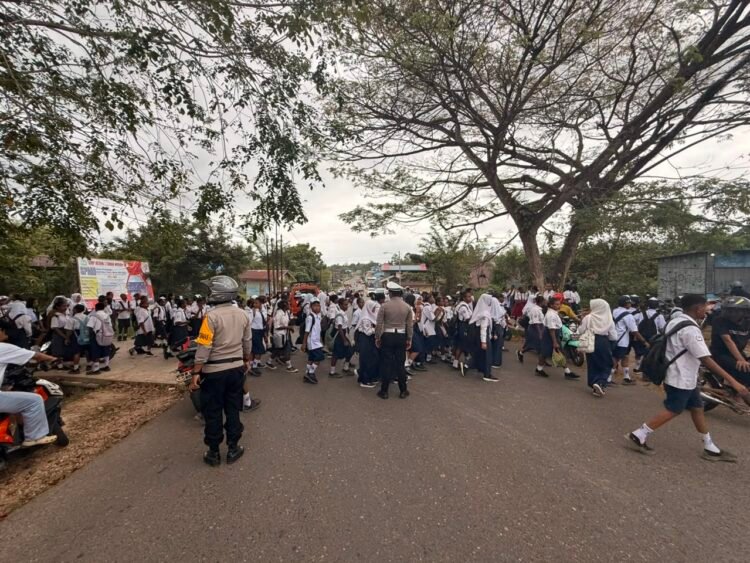 Satlantas Polres Boven Digoel Intensifkan Strong Point Siang, Wujudkan Keamanan Pelajar saat Jam Pulang Sekolah